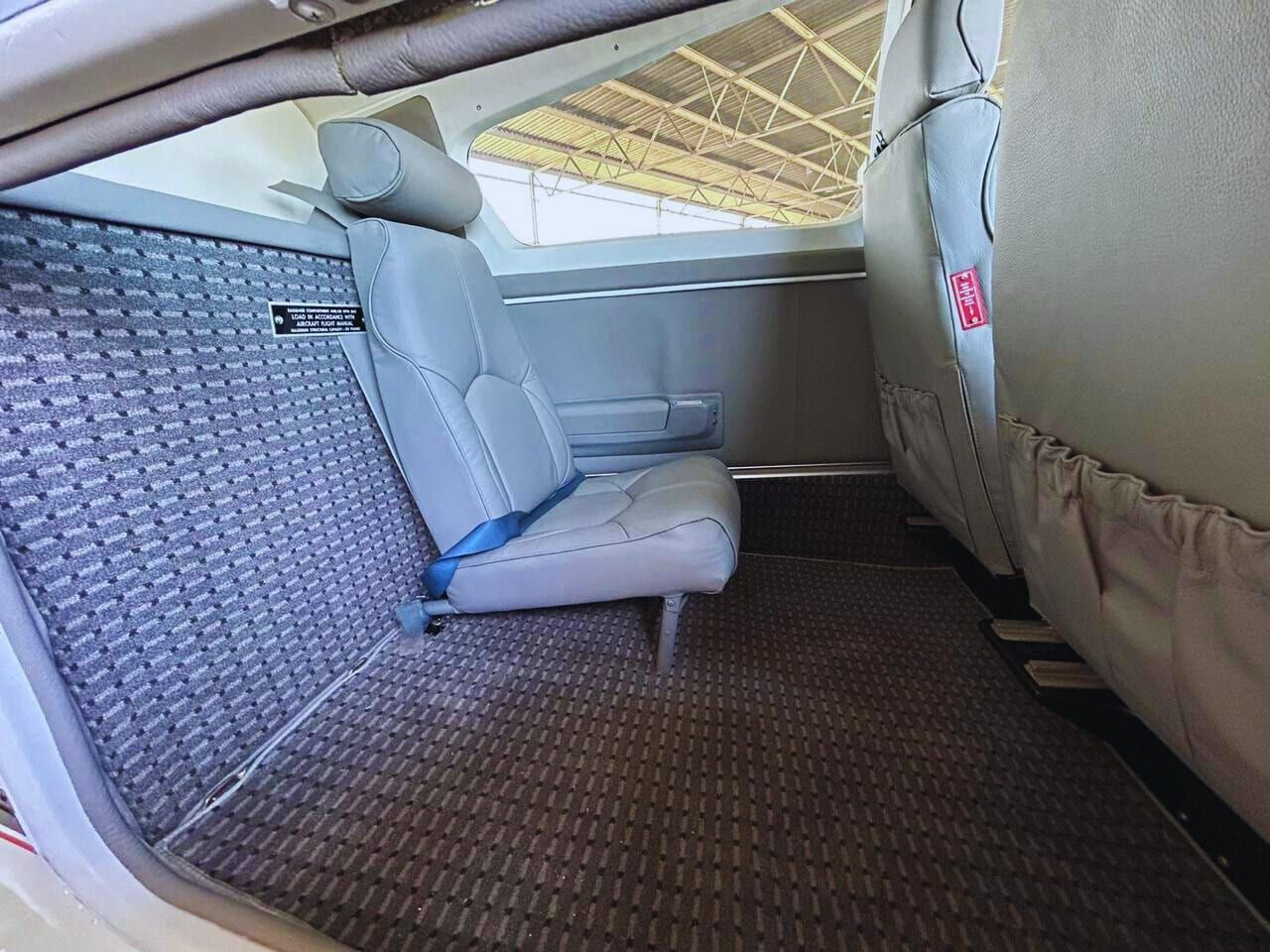 1991 Beechcraft F33A Bonanza: Optional seat in rear baggage area