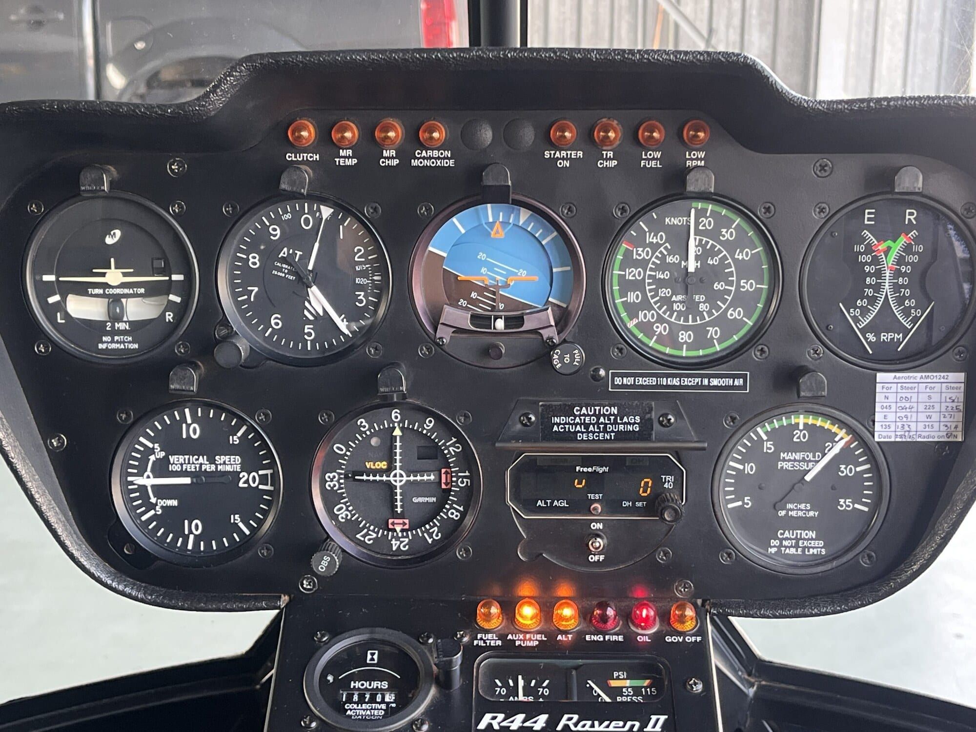 2010 Robinson R44 Raven II: Instrument panel – nine-hole layout